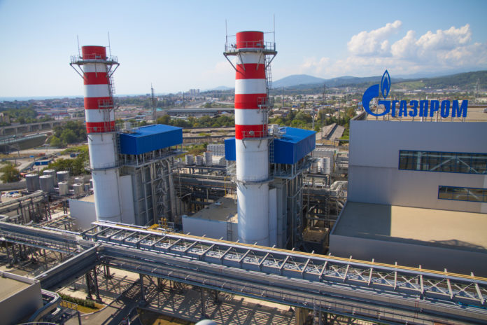 Russia's Gazprom company logo on the roof of thermal power plant