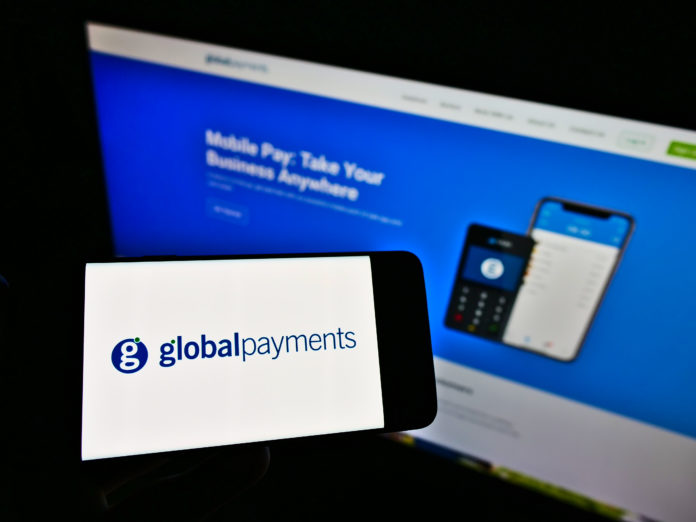 Cellphone with logo of American payment services provider Global Payments Inc.