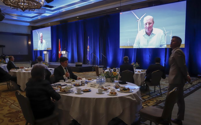 Greg Abel, chairman of Berkshire Hathaway Energy speaks via video link at the Global Business Forum in 2020