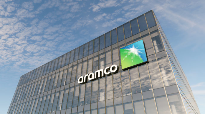 Aramco Signage Logo on Top of Glass Building