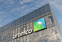 Aramco Signage Logo on Top of Glass Building