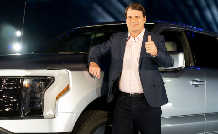 Ford Motor Company CEO Jim Farley speaks at an event to launch the new all-electric F-150 Lightning pickup truck at an event at the Ford World Headquarters in 2021